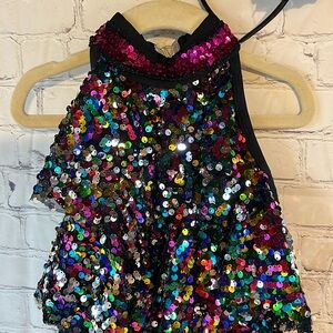 Dance costume with built in black shorts. Layers of sequins. Bow headband